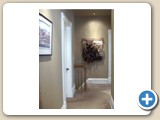 Second floor hallway with top of maid's staircase